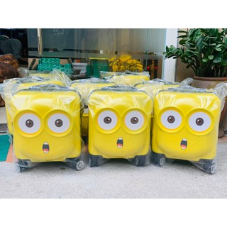 Quà tặng Manulife Valy trẻ em minion vuông mặt cười màu vàng bốn bánh xe đẩy tay cầm hợp kim sản xuất Việt Nam cứng cáp